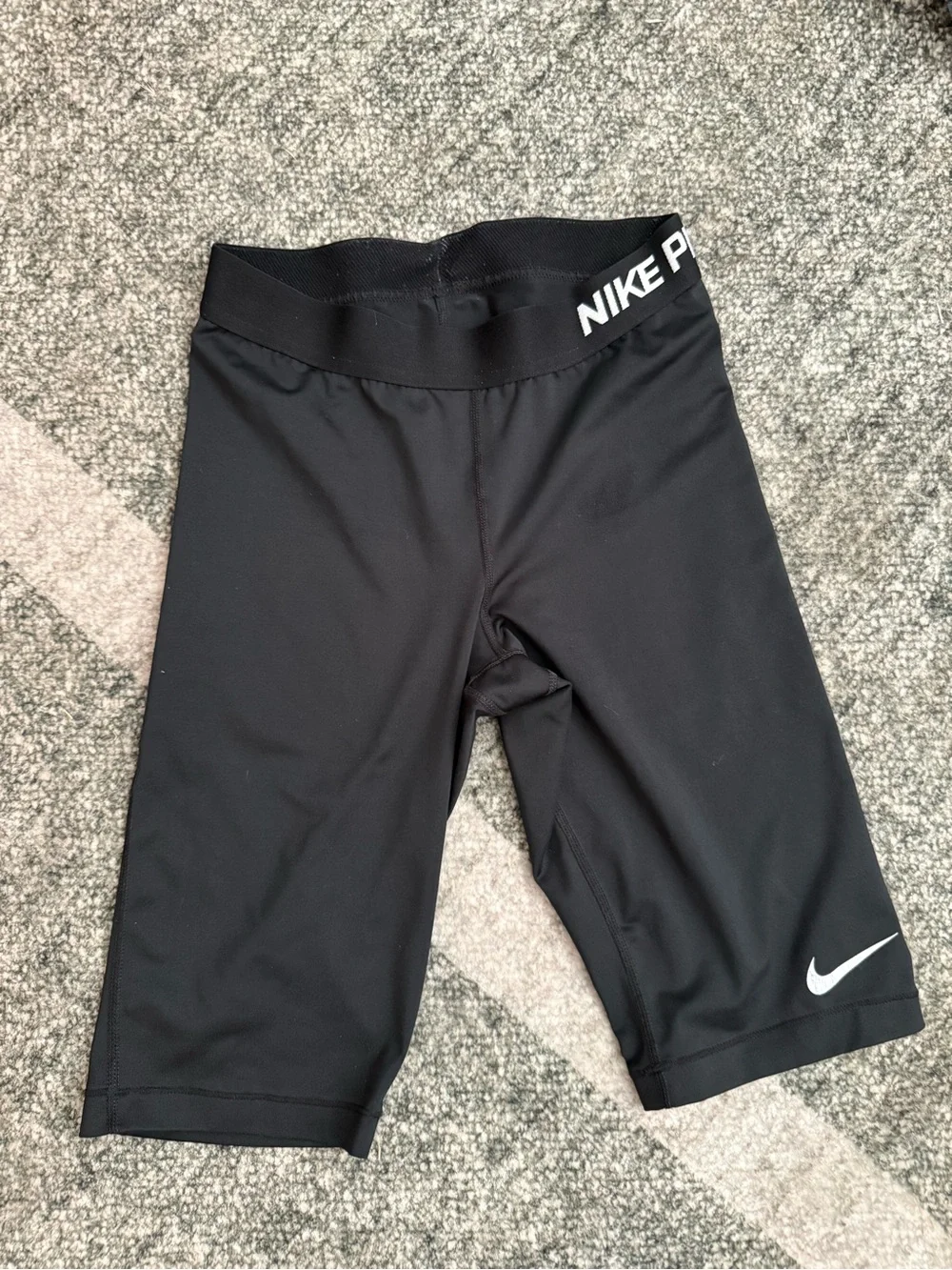 Nike Kids Black Performance Leggings with White Swoosh